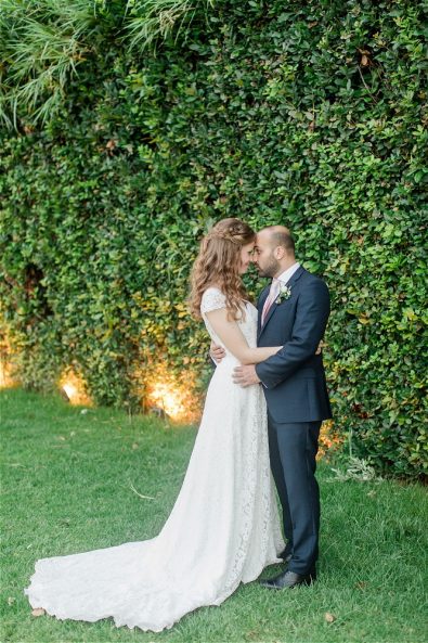 Couple hugging and kissing at garden