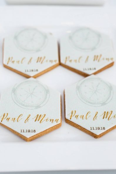 Custom made sugar biscuits with hand-painted sugar paste.