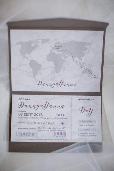 Ticket inspired wedding invitation for a destination wedding in Greece.
