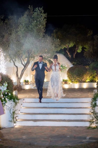 Bride and groom arriving at the wedding party reception in the Athenian Riviera.