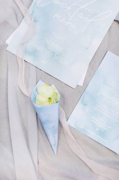 Light blue and white wedding stationery for a summer wedding.