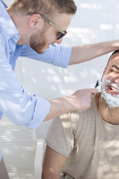The groom's best friend shaving him before the wedding ceremony according to the Greek wedding traditions.