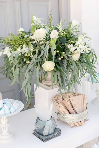 Elegant, chic and simple flower arrangements with greenery and white flowers for an island chic wedding in Sifnos.