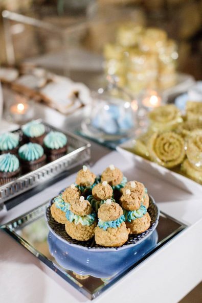 Religieuse sweet french treats with blue and white buttercream filling.