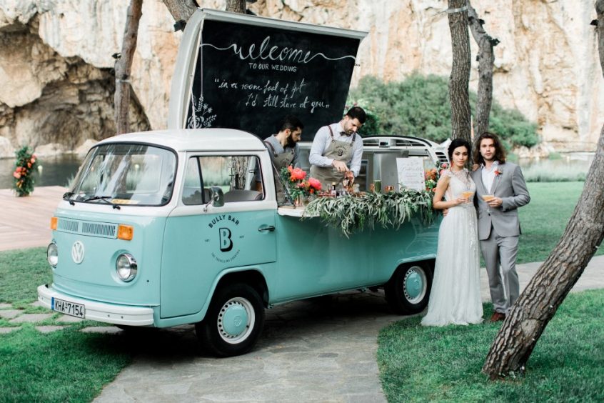 Bully bar management company in Greece in their van with wedding couple