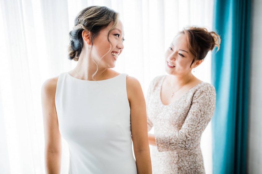 Dressing the bride before her wedding