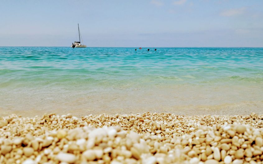 sea view from beach with pebbles