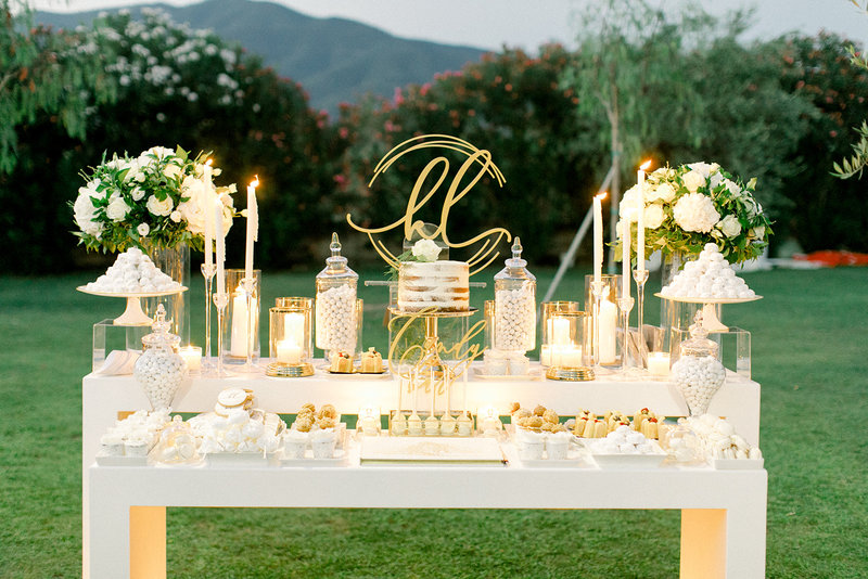 candy bar with flowers and candles