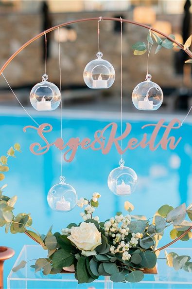 Closeup decoration with candle bubbles on table at destination wedding in Ios