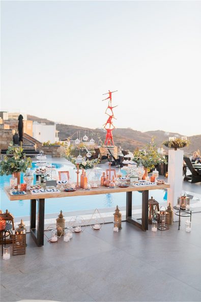 Candy bar at pool for a destination wedding in Ios