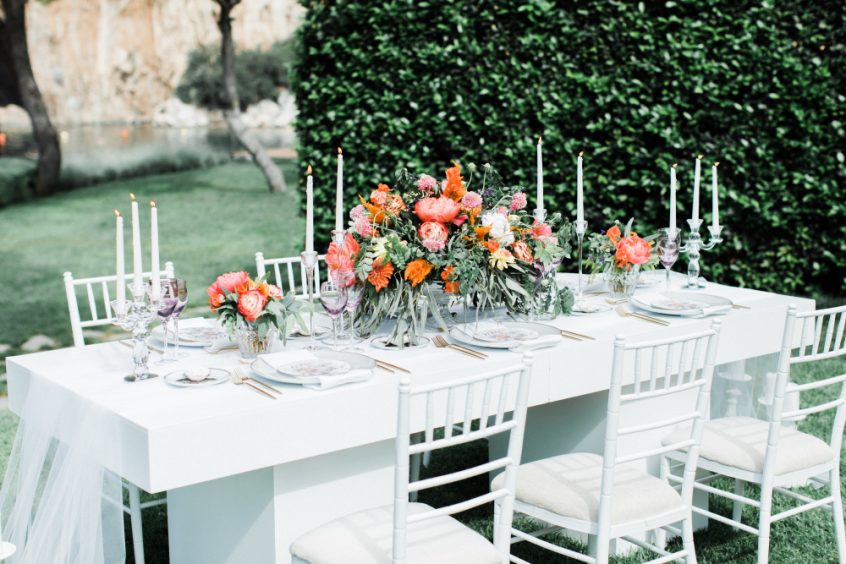 Wedding table decorations with flowers and candles